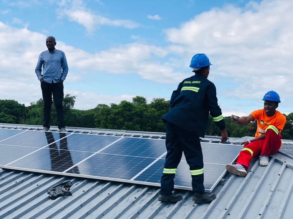 Zonful Energy technicians installing solar panels on a rooftop